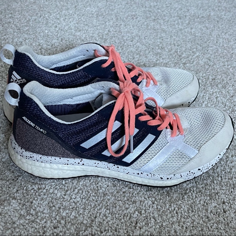 White/navy/coral adizero tempo running shoe.